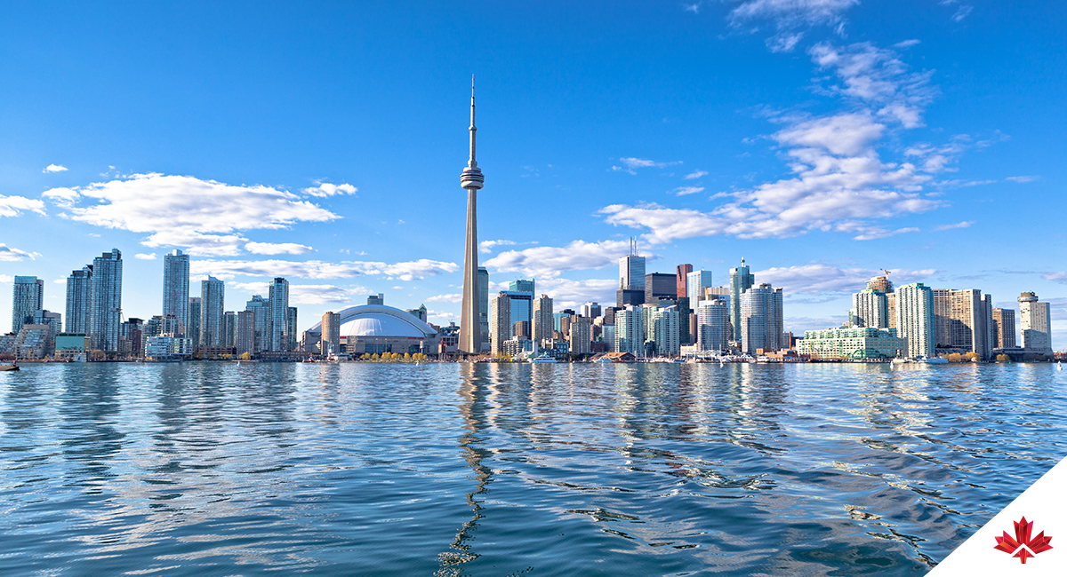 View of downtown Toronto from the water with the CN Tower in the center.